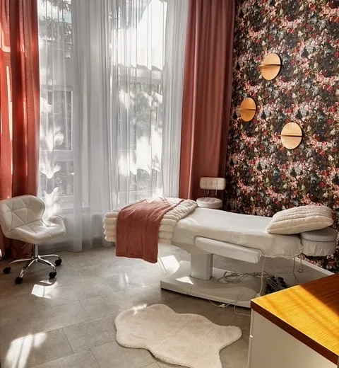 The massage room — the table by the window