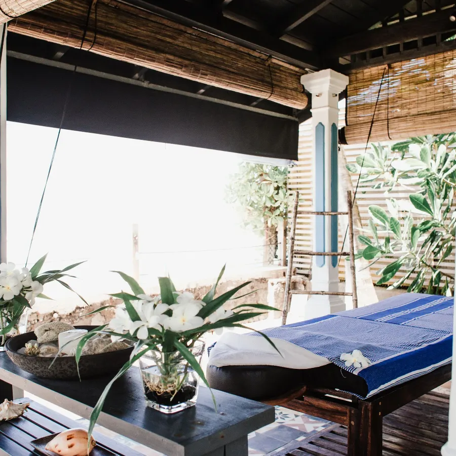 Massage table ready in a sunlit studio